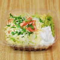 Carne Asada Burrito Bowl · Includes onions, cilantro, lettuce, tomato, cheese, sour cream, cheese, sour cream, rice, be...