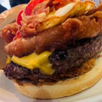 Hangover Burger  · America cheese, bacon, onion ring, hash brown and sunny side up egg. 
