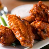 TRADITIONAL BUFFALO FLAVORED WINGS  · TRADITIONAL BUFFALO FLAVORED  WINGS 