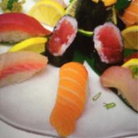 Sushi Regular · 7 pieces of assorted sushi served with tuna roll.
