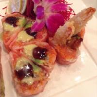 Pink Lady Roll · Shrimp tempura, spicy tuna, avocado and eel with soy paper.
