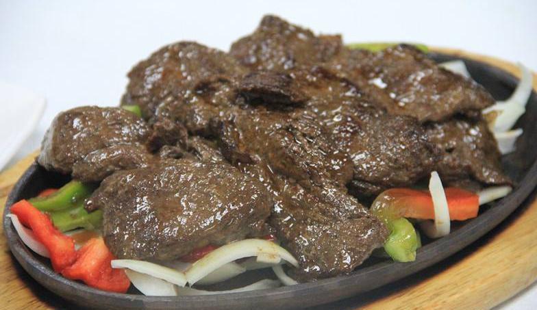 4. Mandarin Steak Teriyaki · Marinated frank steak cook with onion, pepper mushroom, and teariyaki sauce come with a hot sizzling plate.