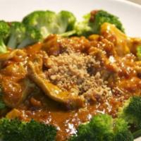 5. Amazing Curry  · Our famous peanut curry sauce cook with coconut milk, over a bed of stearm broccoli and spin...