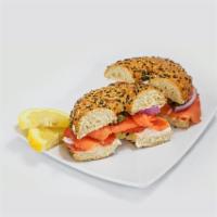 Lox & Bagel · Toasted bagel, cream cheese, smoked salmon, onions, tomato and capers.