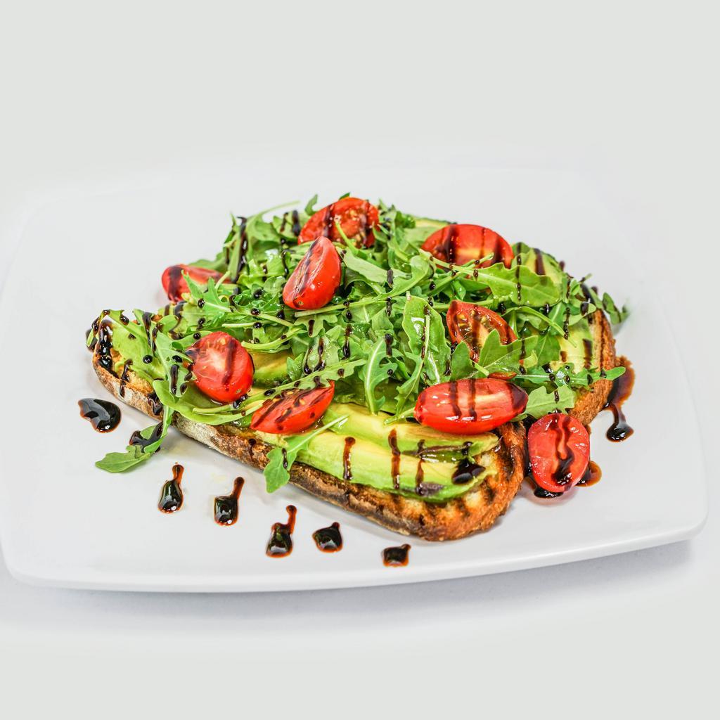 Avocado Toast · Avocado, 2 slices of bread or bagel, cherry, tomato, balsamic glaze and arugula. Add eggs for an additional charges.