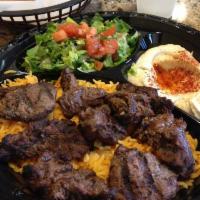 Beef Kabob Plate · Premium Tender beef cubes grilled.  Served with hummus, salad, rice, pita bread.