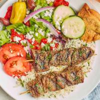 Beef Kebob Feast · Marinated Beef tender with a lemon tang. Served with our Taziki sauce. Served with Greek sal...