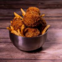 Boudin Balls · Homemade fried boudin stuffing served with french fries and honey creole remoulade.