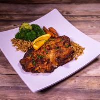 Blackened Tilapia · Fresh tilapia, blackened then drizzled with spicy lemon butter. Served with dirty rice and b...