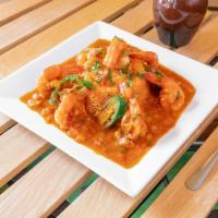 Camarones a la Diabla · Jumbo shrimp in spicy chipotle sauce. Served with rice.