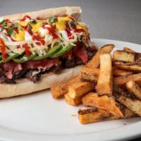 L Sandwich · Filled with grilled skirt steak with pico de Gallo, Avocados, Cheese, Mayo, Ketchup, Mustard...