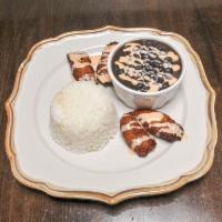 Plato Principal · White rice, seasoned black beans and maduros (sweet, fried yellow plantains) drizzled with b...