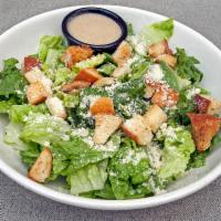 Caesar Salad · Romaine lettuce topped with Parmesan cheese, croutons and our classic Caesar dressing.