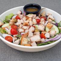 Grilled Chicken Salad · Our classic tossed salad topped with 2 fresh grilled chicken breasts.