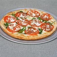 White Feta Pizza · Fresh tomatoes, spinach, garlic, olive oil, feta and mozzarella.
