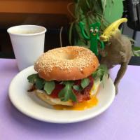 Breakfast Sandwich · Local egg, scrambled or fried to order, with Cabot Sharp Chedder. Served on a toasted bagel,...