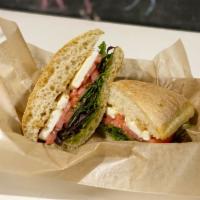The Fed Hill Sandwich · Fresh house ciabatta with fresh local mozzarella, tomato, pesto, fresh greens and a balsamic...