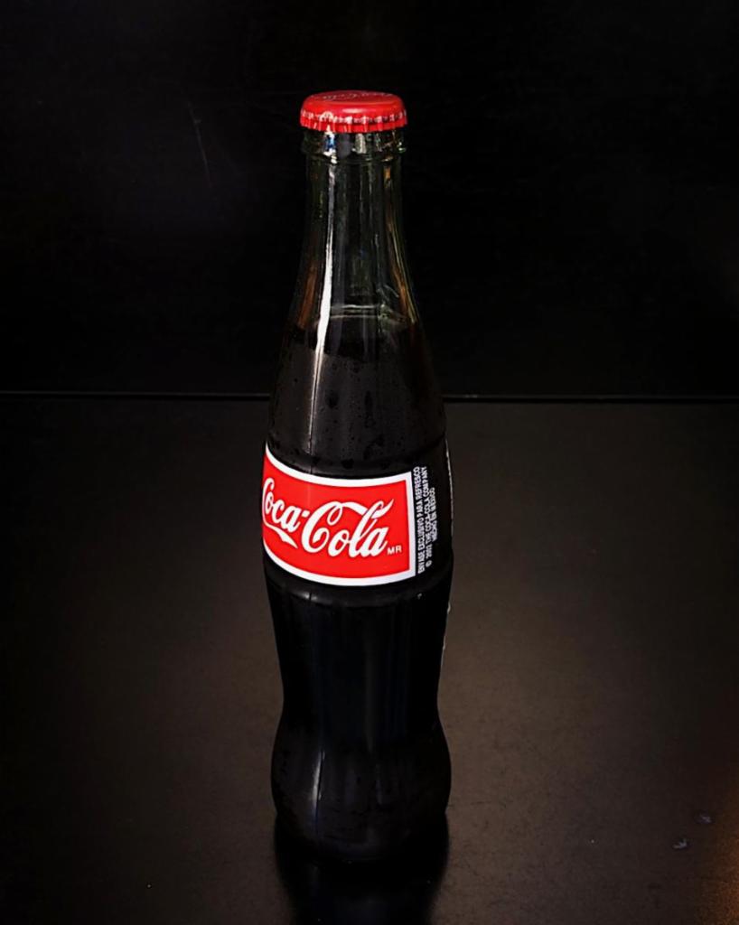 Mexican Coca Cola  · Bottled in Mexico, in the classic glass bottle, made with cane sugar, not high fructose corn syrup. So good.