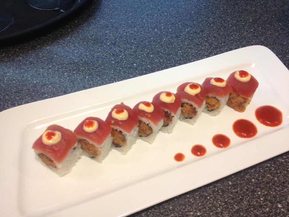 Tuna Heaven Roll · 8 pieces per order. Crunchy spicy tuna roll, topped with fresh tuna, spicy mayo, Sriracha.