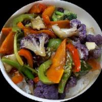 Stir-fried Market Vegetable (Vegan) · Local greens stir-fried in a garlic sauce