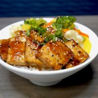 Small Bowl - Tofu Teriyaki Bowl* · Stir-fry tofu in garlic butter and teriyaki sauce served with white rice and steamed vegetab...
