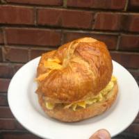 Egg and Cheese Croissant · Scrambled egg with cheese on a butter croissant.