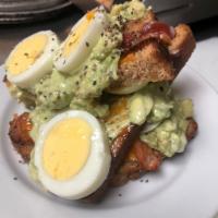 breakfast Avocado toast  · Bacon, avocado , melted cheddar cheese , boiled egg on wheat toast 