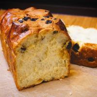 Raisin Bread · small loaf packed with bunch of raisins. 