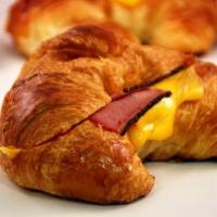 Pastrami Cheese Croissant · Flakey Croissant sandwich with Pastrami and american cheese