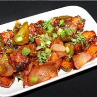Chilli Paneer · Cottage cheese cooked with onions and bell pepper in a chili garlic sauce.