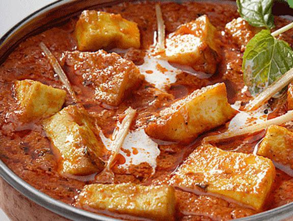 Paneer Tikka Masala · Cottage cheese cubes cooked in butter-tomato sauce and special tikka masala.