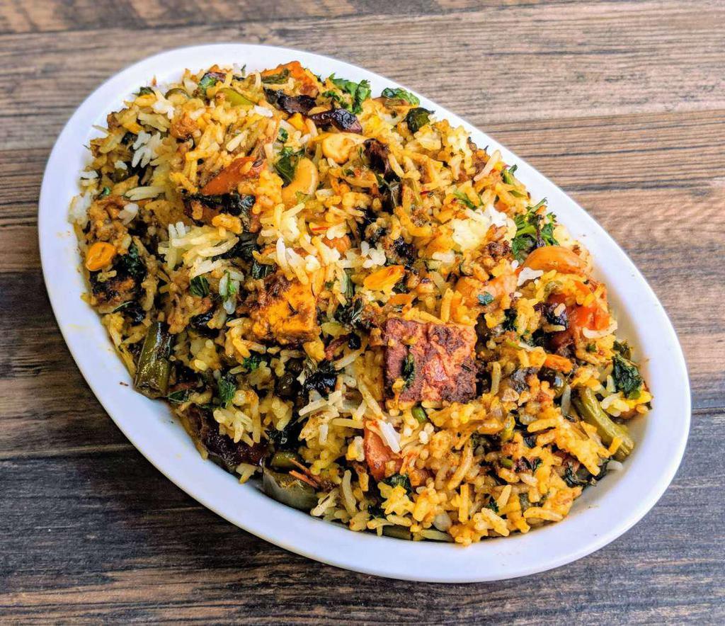 Veg Biriyani · Fresh vegetable with basmati rice cooked to perfection.