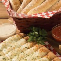 Garlic Bread · 8 sticks with garlic, Parmesan and dipping sauce.