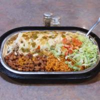 Burrito de Eduardo Plate · A one of a kind burrito filled with slow roasted shredded turkey and fresh sour cream wrappe...