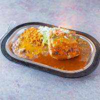 Stuffed Sopapilla Plate · Sopapilla filled with ground beef and beans, topped with melted cheddar cheese.