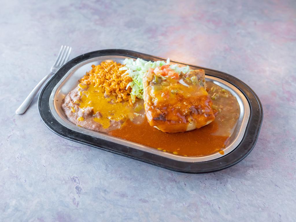 Stuffed Sopapilla Plate · Sopapilla filled with ground beef and beans, topped with melted cheddar cheese.