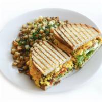Eggwich · Scrambled eggs, smoked bacon, smashed avocado, tomatoes, butter lettuce, cheddar cheese, chi...