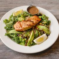 Kale Salad · Fresh kale dressed with mixed greens, flame grilled salmon, avocado, quinoa, and roasted veg...