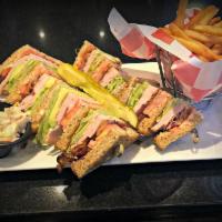 Turkey Club · Freshly sliced deli turkey, lettuce, tomato, bacon on choice of bread. Served with a side or...