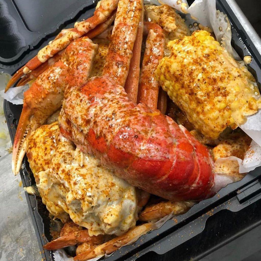 Original Lover Box · Grilled chicken, jumbo shrimp, garlic herb mashed potatoes, corn, a boiled egg, and Goldies sauce. Add extras for an additional charge.