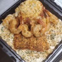Goldies Sea Pasta · Grilled salmon, grilled shrimp, and crab creamy Alfredo pasta, sauteed spinach, and penne pa...