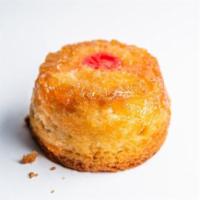 Pineapple Upside Down Cake · A soft, tender and buttery cake with a caramelized brown sugar pineapple & cherry topping