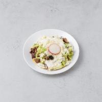Bisteck Tostada · Steak. Crispy tortilla with refried beans, lettuce, sour cream and cheese. Sliced avocado an...