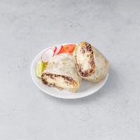 Pollo Burrito · Chicken flour tortilla filled with rice, refried beans and cheese, accompanied with salad an...