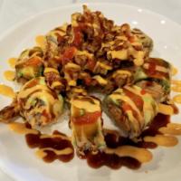 Romo Roll Special · Spicy California roll topped with avocado, deep-fried crawfish, and Zena special sweet and h...
