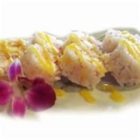 Fantastic Roll Special · Crab meat on top, mango, avocado, salmon, cream cheese with soy paper and mango sauce.