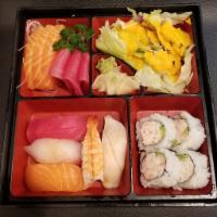 Sushi Sashimi Bento Box · Total 6 pieces of tuna, salmon sashimi and 5 pieces of sushi. Served with 4 pieces Cali roll...