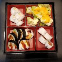 Roll Bento Box · 6 pieces of shrimp tempura roll, 4 pieces of spicy tuna roll. Served with four pieces Cali r...