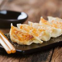 Gyoza · Japanese pan-fried dumplings.