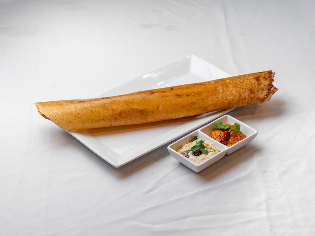 Masala Dosa · Savory crepe filled with mildly spiced mashed potatoes and onions.